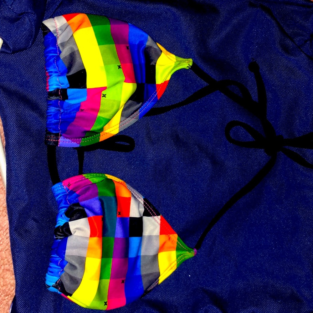Hurley brand multi colored swimsuit. Size small, adults
